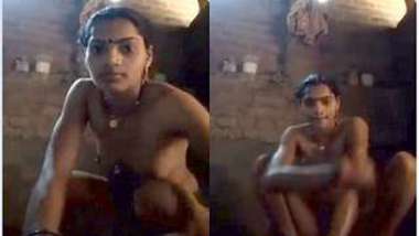 Young Desi woman sets the camera against her and starts washing XXX body
