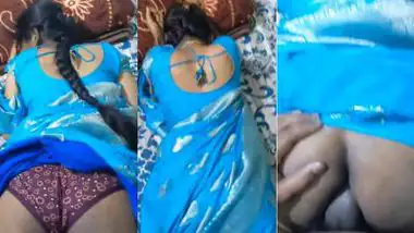 Desi chudai of Bhabhi lying on bed in blue saree