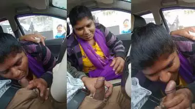 Telugu woman gives a desi blowjob to her man in a car